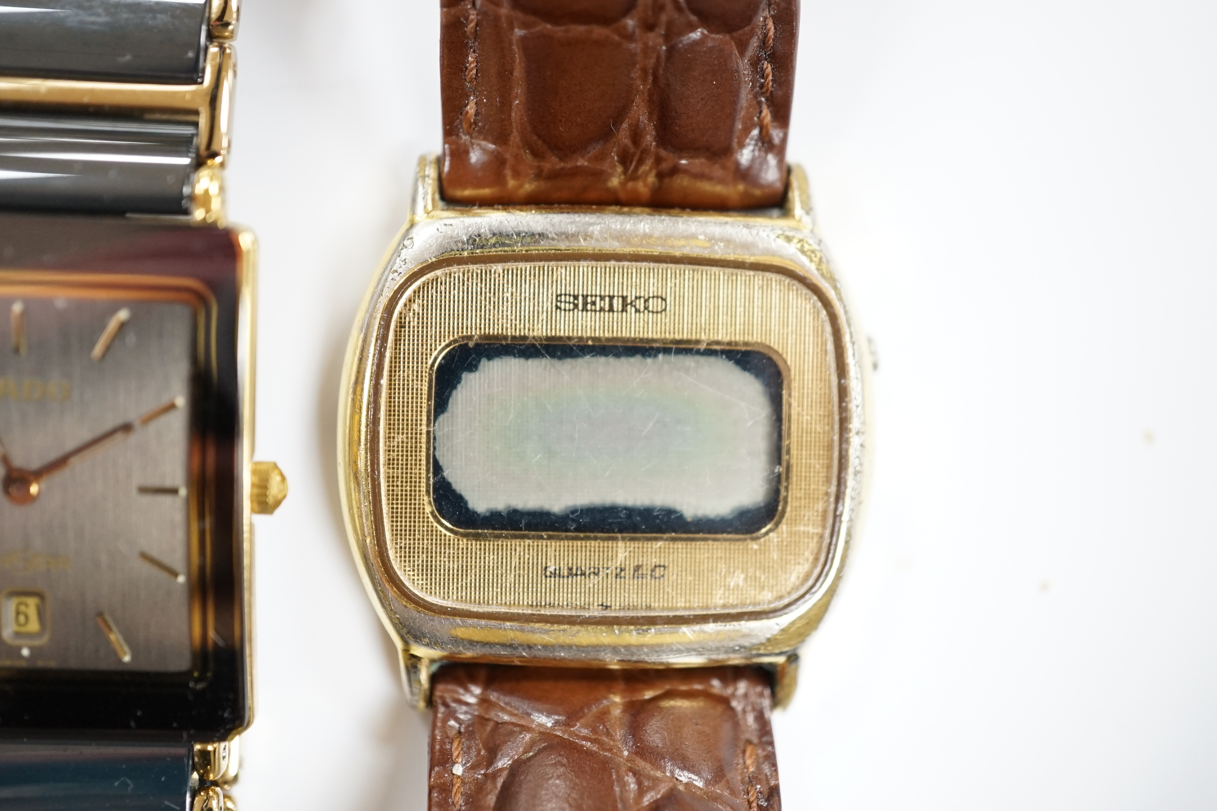 A gentleman's ceramic and gilt steel Rado Diastar wrist watch and a Seiko wrist watch.